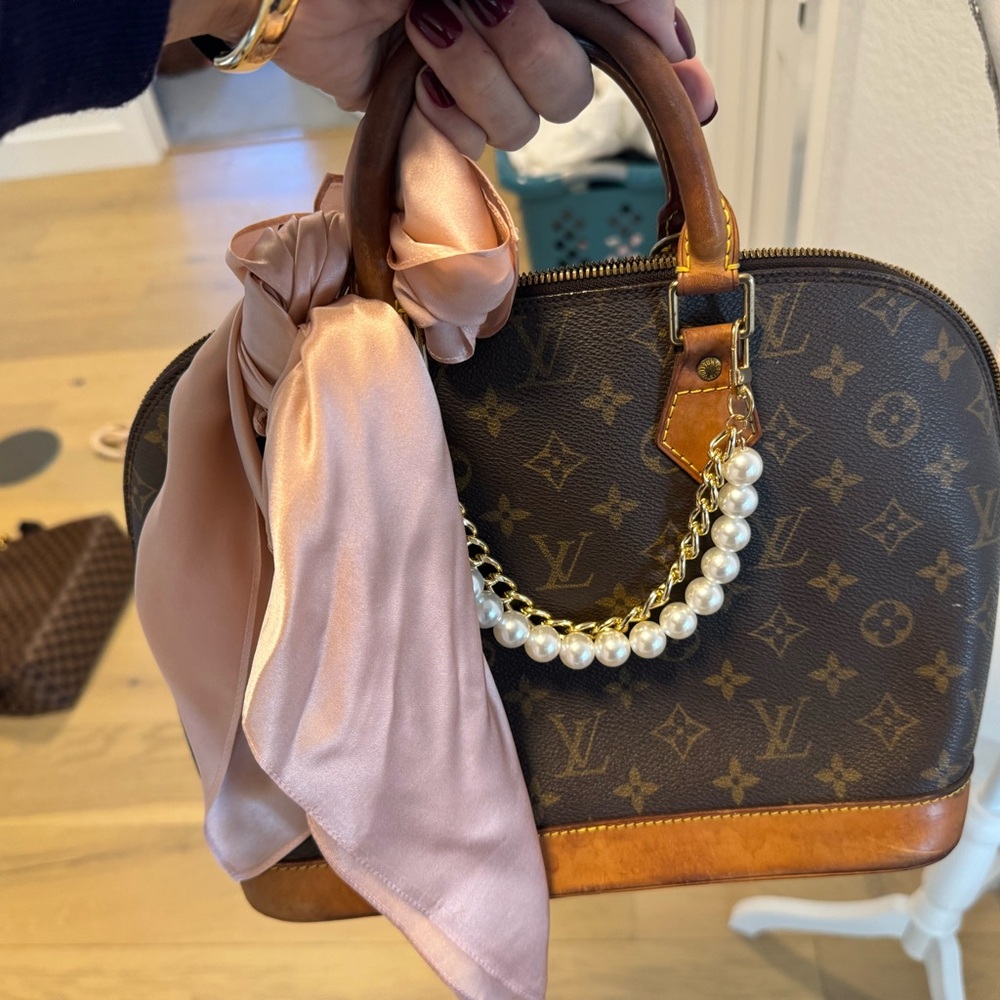 Louis Vuitton purse!!! Super fun and will get plenty compliments!